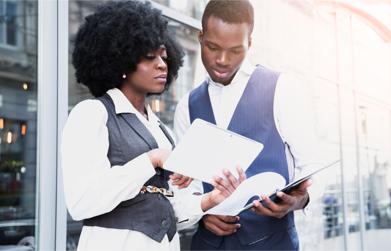 Black professionals in modern boardroom